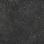 Laminated porcelain surface in black oxide exhibits a granular, mottled texture with dark gray and black tonal variations, displaying a rough, uneven finish.